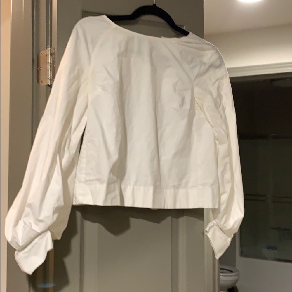 Cropped white top with bubble sleeves